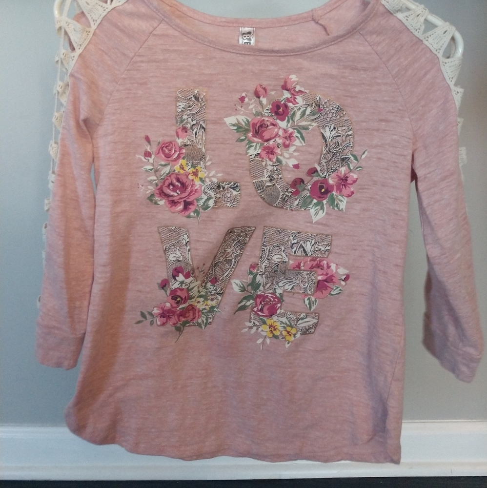 Light pink "LOVE" shirt with flower accents